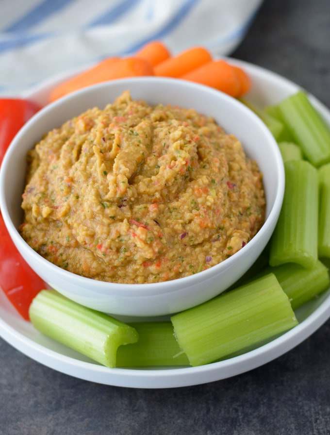 This Spicy Roasted Red Pepper Hummus is made without tahini and is an easy healthy snack! 