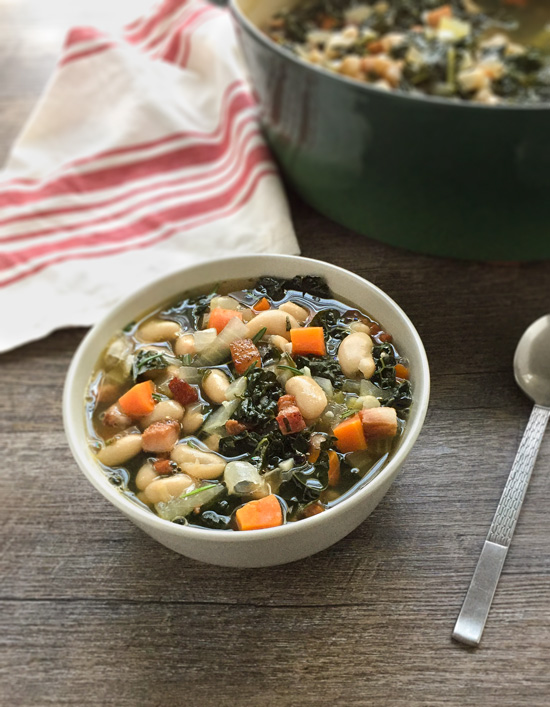 White Bean Soup with Kale - a healthy and easy soup recipe featuring canned beans, which means you can have this even as a weeknight meal! 
