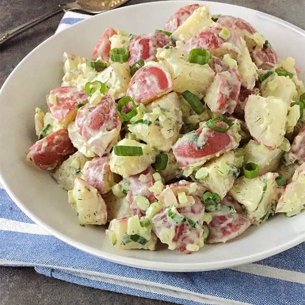 This Baby Red Potato Salad features a light and creamy dressing and is sure to become one of your favorite cookout side dishes this Summer!