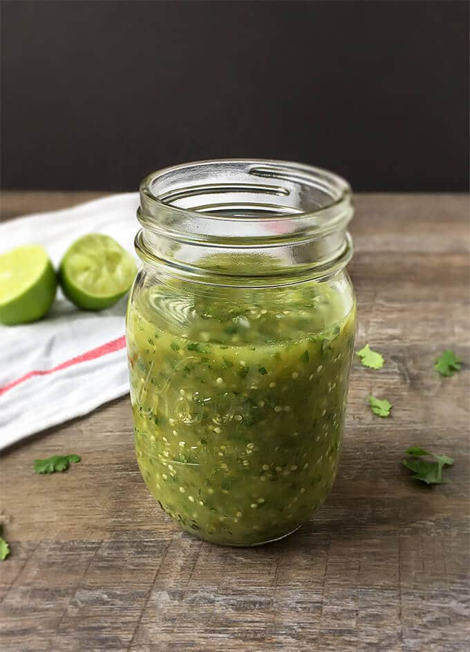 Roasted Tomatillo Salsa - Made with roasted tomatillos, onion, cilantro, jalapeño and lime. It makes a delicious and healthy dip for your favorite tortilla chips! 