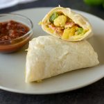 These Healthy Freezer Breakfast Burritos make a tasty and portable breakfast for those busy mornings! Cheese and bacon add a ton of flavor!