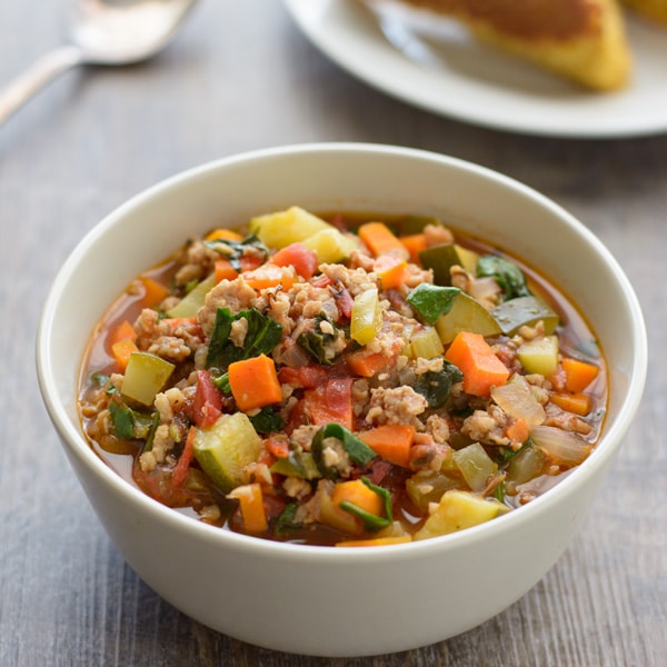 Pair this Italian Sausage Vegetable Soup with some homemade cornbread for one delicious dinner! It's a hearty and healthy soup!