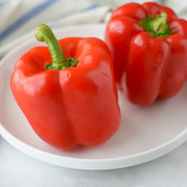 Red Bell Peppers on a plate.