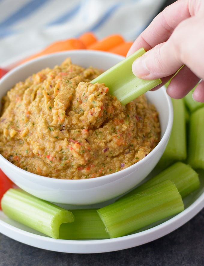 This Spicy Roasted Red Pepper Hummus is made without tahini and is an easy healthy snack! 