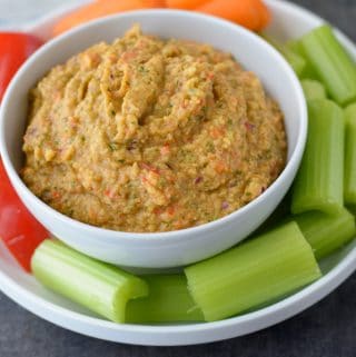 This Spicy Roasted Red Pepper Hummus is made without tahini and is an easy healthy snack!
